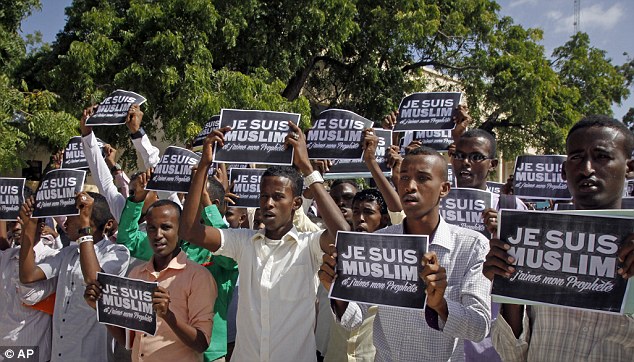 The students carried signs which aped the 'Je Suis Charlie' posters which became synonymous with the Western peace rallies