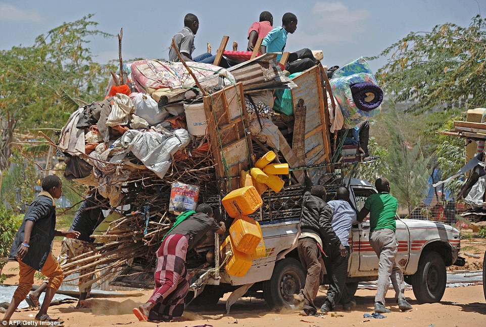  Some trucks carried so many possessions that men were forced to run alongside them to make sure that nothing fell off