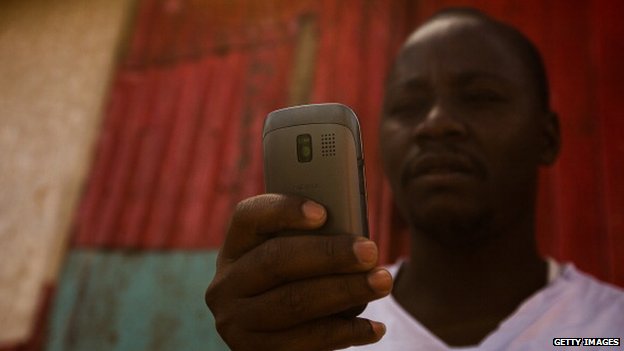Man on a mobile phone in Kenya