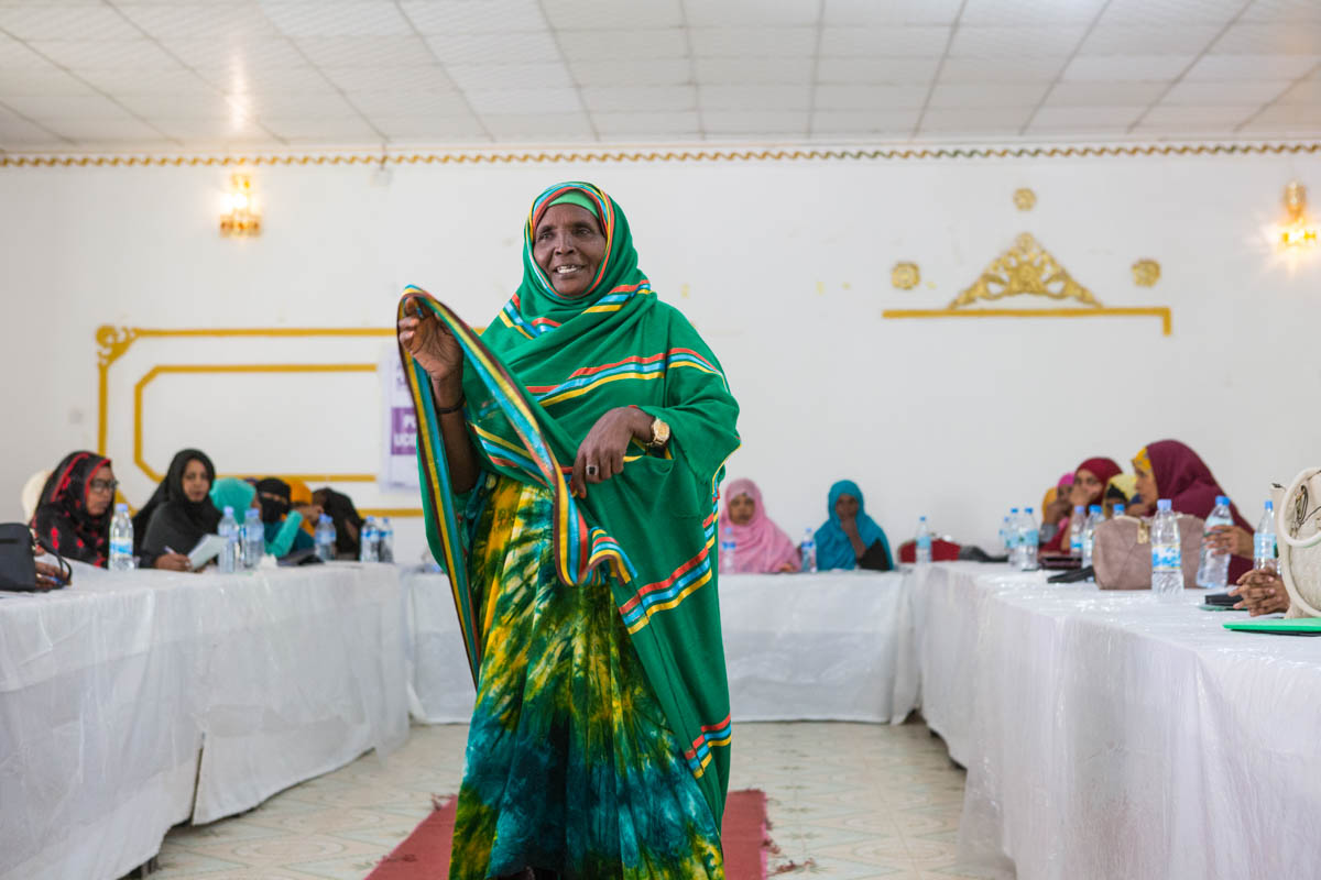 A woman speaks during a training session for female party campaigners in Guleid Hotel. 'We want people to vote for us without nepotism, and to campaign about positive change,' says Xakun Cali Daahir. [Kate Stanworth/Saferworld/Al Jazeera]