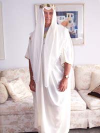 male%20wearing%20an%20embroided%20Thawb%