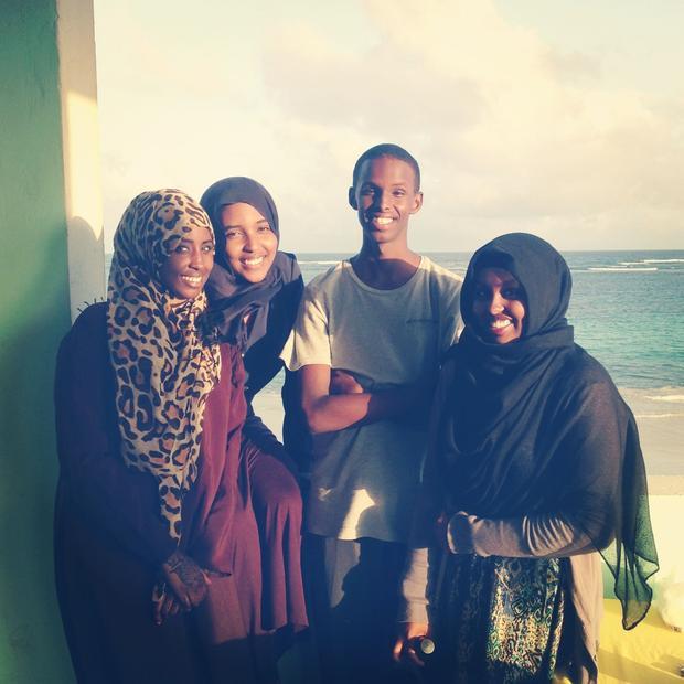 Abla Elmi (second left)  posing with Diaspora youth from England  Finland and America.