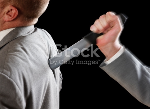 stock-photo-14311717-businessman-stabbed