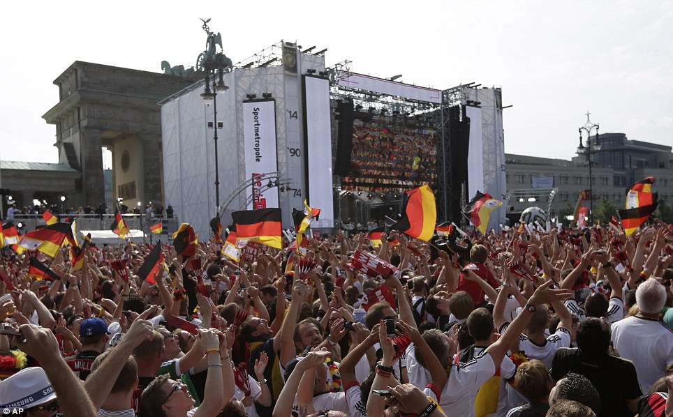 Final destination: They waited patiently in party mood for the victors to arrive at the iconic Brandenburg Gate later in the morning