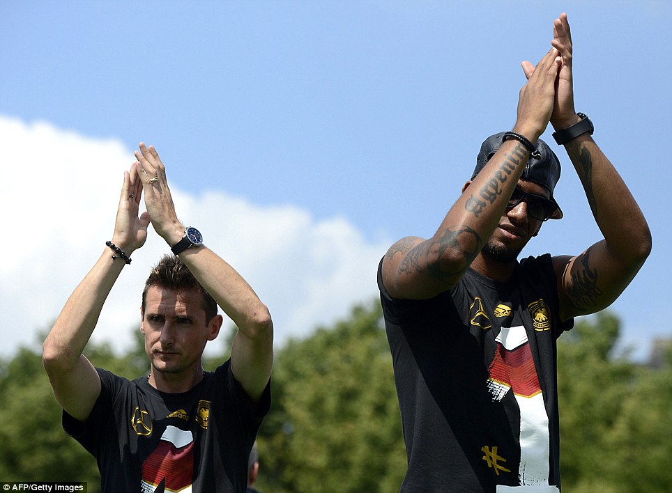 Applauds: Miroslav Klose and Jerome Boateng take in the atmosphere
