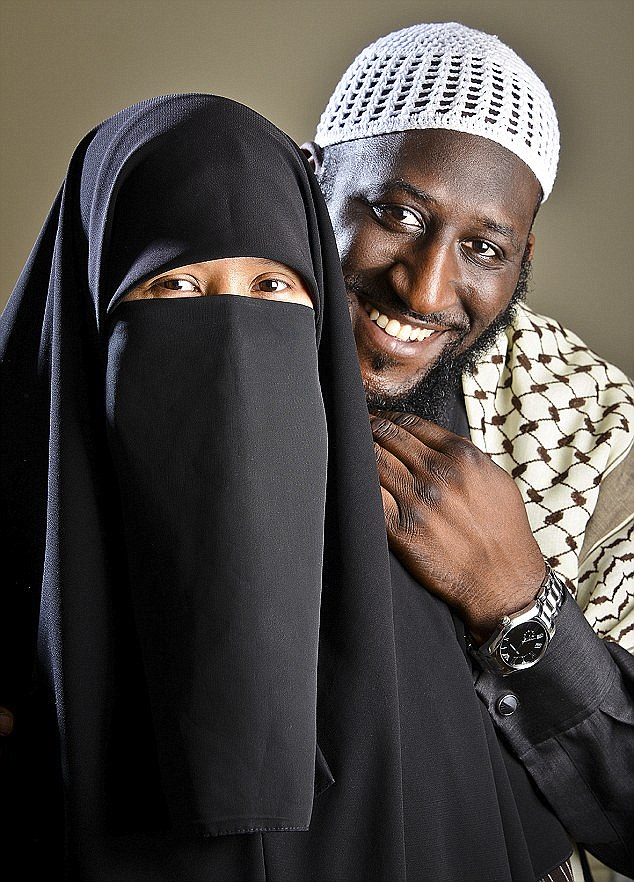 Hasan pictured with Nabilah, who he met on a Muslim dating service - the couple have two children