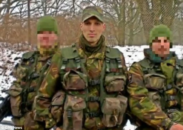 Former life: Yilmaz, pictured when he was in the Dutch Army, left Holland two years ago for Syria so he could fight for fellow Muslims. He said ISIS's brutality comes nowhere close to that of Assad's regime