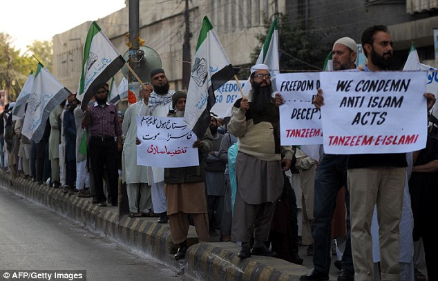 Pakistani activists from Tanzeem-e-Islami gather during a protest on Saturday