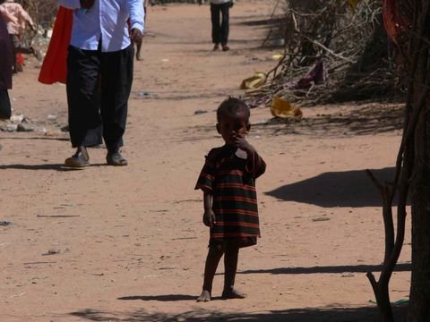 A child checks out a westerner in the Dagahaley refugee camp in Dadaab, Kenya.
