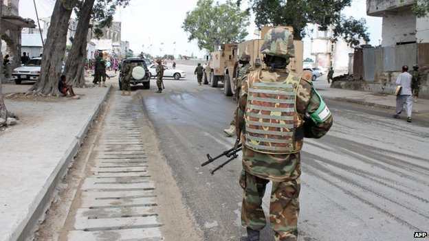 Soldiers of the African Union Mission in Somalia (Amisom) secure an area near a prison in Mogadishu on 31 August 2014