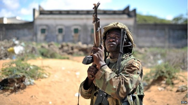 African Union forces march through the town of Golweyn in Somalia's Lower Shabelle region - 30 August 2014