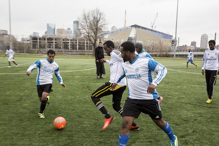 Members of the Somali community play in a soccer tournament in the Cedar Riverside neighborhood in Minneapolis last month.