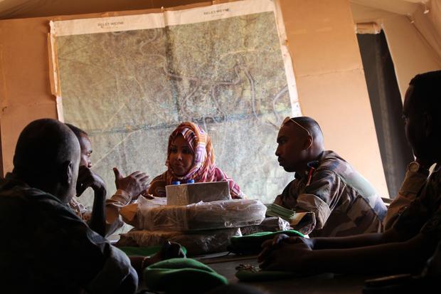 A female AMISON official debriefing the heads of the Djibouti forces based in Belet-  Weyne  Somalia...