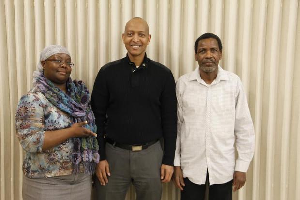 Faisal Hassan (centre) has received the endorsements of Patricia Crooks (left)  the President of the...