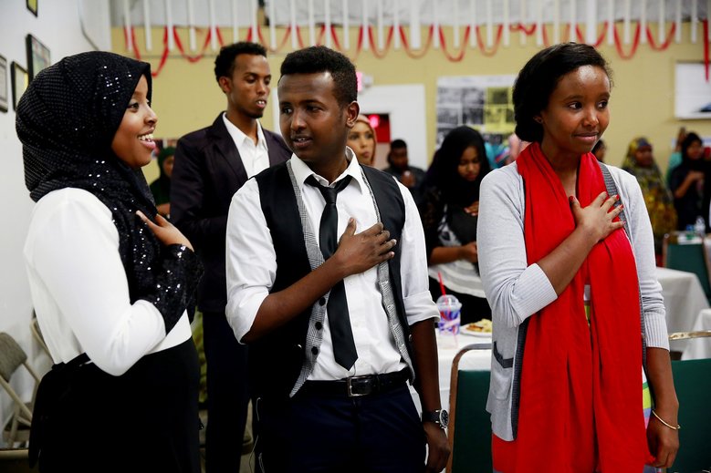 Samira Arte, from left, and Nuredin Omar and Nourah Yonous attend a recent event at the Somali Community Services of Seattle. Yonous, 28, recently brought in a female presidential candidate to meet the local Somali community. Yonous would like to see women elected in the next election.