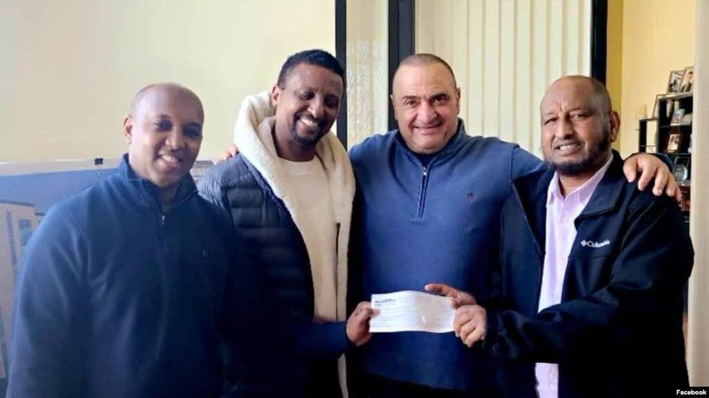 Bassim Sabri (Labaad midgta) iyo guddiga gurmadka suuqa Waaheen ee Minnesota