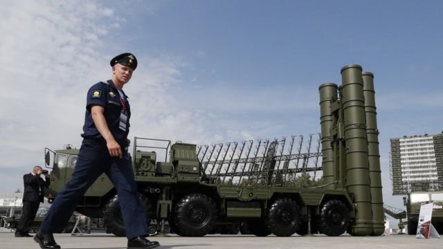 File photo: A Russian military official walks in front of The S-400 Triumph anti-aircraft missile system, 22 August 2017