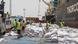 Workers unload NOGs' food rations from the Thorco Liva ship before loading trucks at Berbera port of Somaliland