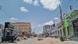 A white car drives through a dusty street in Somaliland's capital, Hargeisa