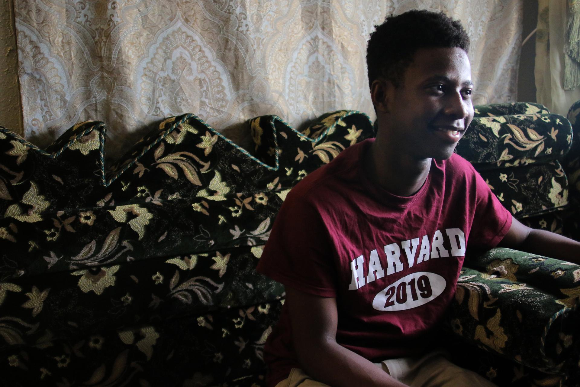 Boston, MA - 06/8/15 - New Mission High School valedictorian Fatah Adan in his Jamaica Plain home. He will attend Harvard in the fall. Lane Turner/Globe Staff Section: MAG Reporter: Slug: 061415Chinatown