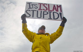 'It's Islam stupid!' sign